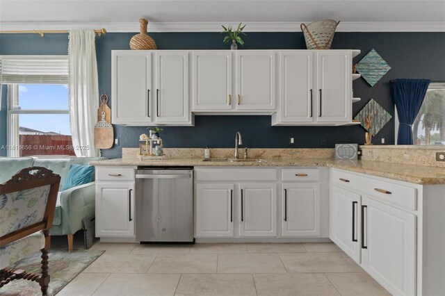 402 SE 30th Ter, Homestead, FL 33033 - kitchen with stainless steel dishwasher, a sink, white cabinetry, crown molding, and healthy amount of natural light