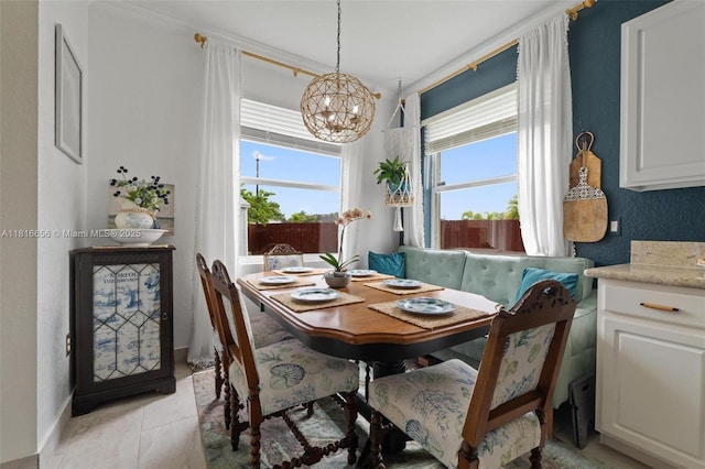 402 SE 30th Ter, Homestead, FL 33033 - dining area with a chandelier, ornamental molding, and baseboards