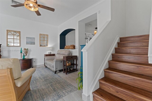 402 SE 30th Ter, Homestead, FL 33033 - staircase with ceiling fan, tile patterned floors, crown molding, and baseboards