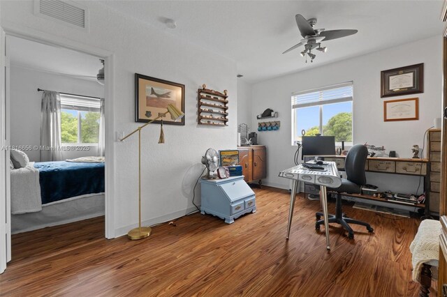 402 SE 30th Ter, Homestead, FL 33033 - office area featuring wood finished floors, ceiling fan, and baseboards
