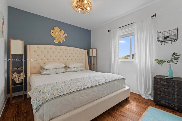 402 SE 30th Ter, Homestead, FL 33033 - bedroom with wood finished floors