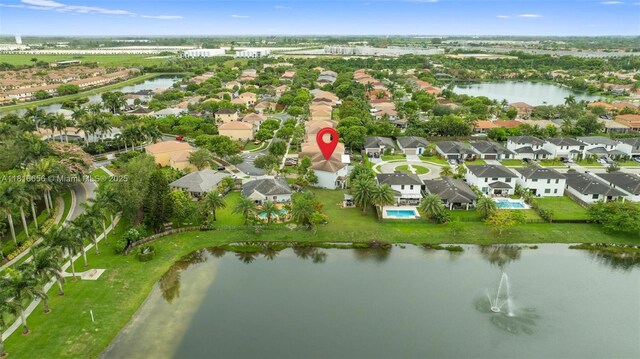 402 SE 30th Ter, Homestead, FL 33033 - aerial view of property and surrounding area featuring a large body of water and nearby suburban area