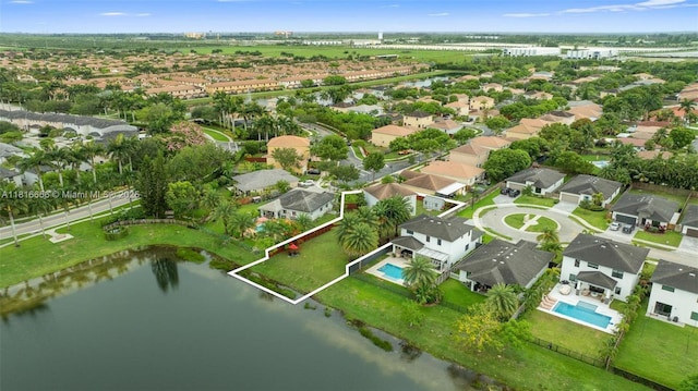 402 SE 30th Ter, Homestead, FL 33033 - aerial overview of property's location featuring property boundaries highlighted, a large body of water, nearby suburban area, and a pool