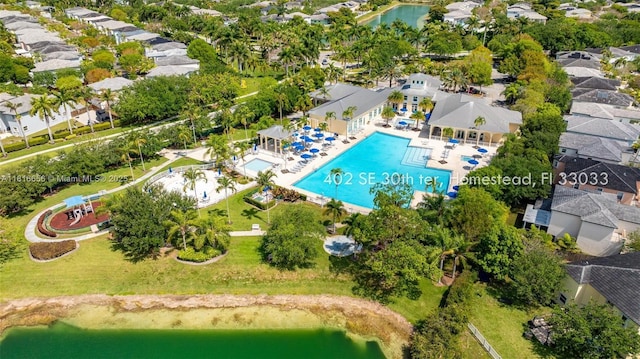 402 SE 30th Ter, Homestead, FL 33033 - aerial perspective of suburban area with a pool area and a nearby body of water