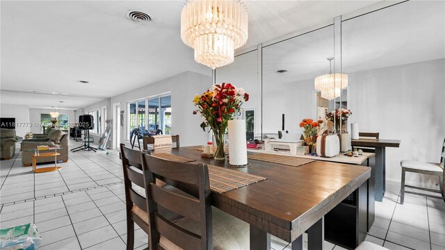 3145 Hollywood Blvd, Hollywood, FL 33021 - dining area with a chandelier and light tile patterned floors