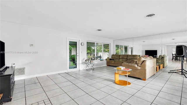 3145 Hollywood Blvd, Hollywood, FL 33021 - living room with light tile patterned floors and baseboards
