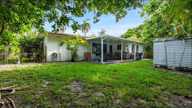 3145 Hollywood Blvd, Hollywood, FL 33021 - rear view of property featuring a patio and stucco siding