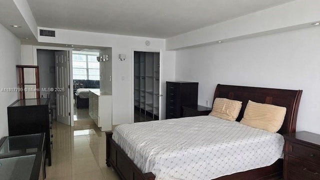 18051 Biscayne Blvd Unit 1501, Aventura, FL 33160 - bedroom featuring a closet and light tile patterned floors