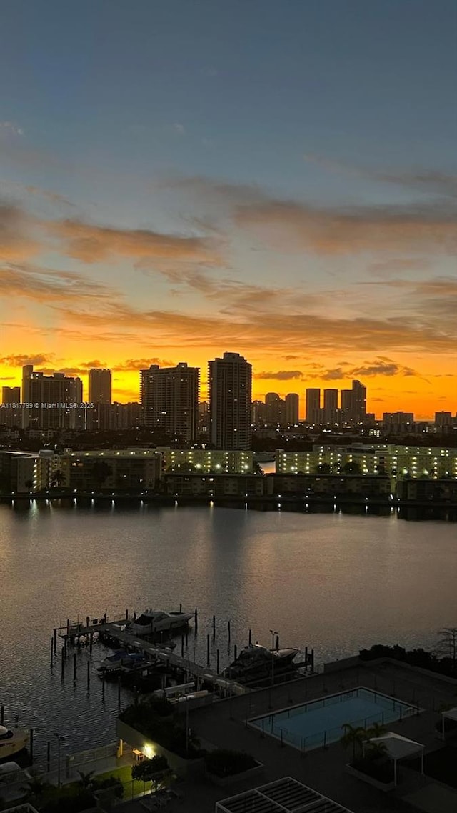 18051 Biscayne Blvd Unit 1501, Aventura, FL 33160 - water view with city skyline and a boat dock