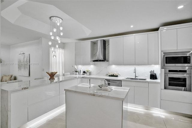 11222 NW 73rd Ter, Doral, FL 33178 - kitchen with wall chimney exhaust hood, appliances with stainless steel finishes, a sink, modern cabinets, and recessed lighting