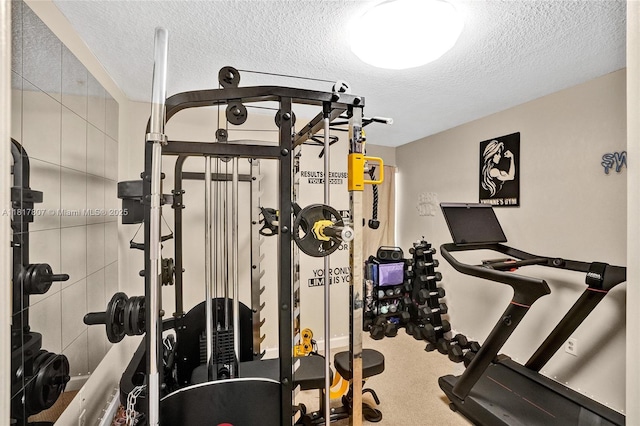 11222 NW 73rd Ter, Doral, FL 33178 - workout room featuring a textured ceiling