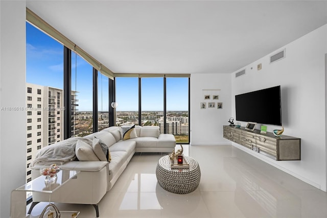 5252 NW 85th Ave Unit 1701, Doral, FL 33166 - tiled living area featuring a wall of windows and baseboards