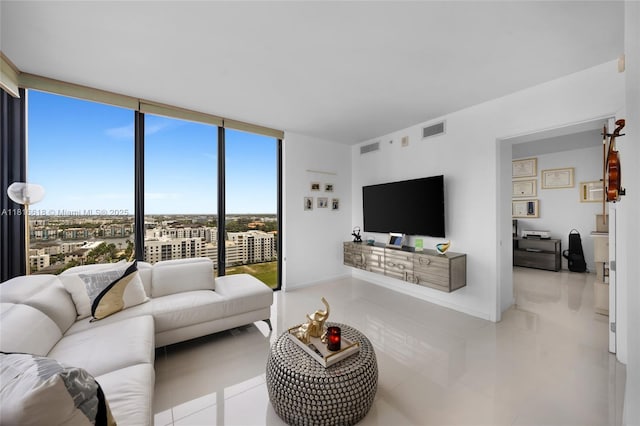 5252 NW 85th Ave Unit 1701, Doral, FL 33166 - tiled living room with floor to ceiling windows