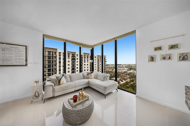 5252 NW 85th Ave Unit 1701, Doral, FL 33166 - living room featuring expansive windows, tile patterned floors, and baseboards