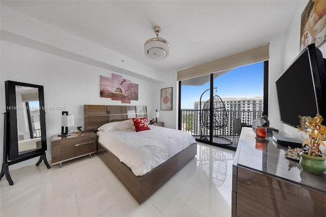 5252 NW 85th Ave Unit 1701, Doral, FL 33166 - bedroom with access to exterior, light tile patterned floors, and a wall of windows