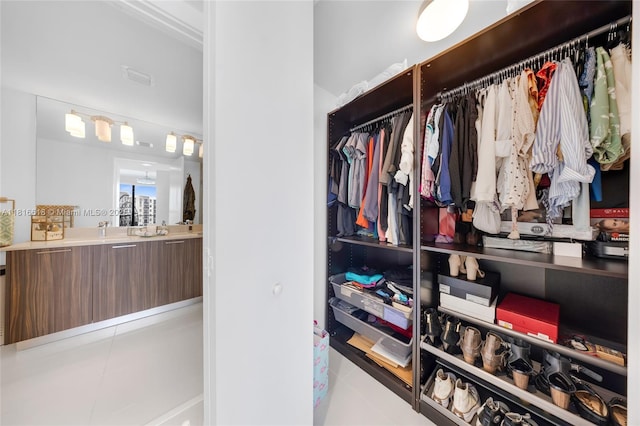 5252 NW 85th Ave Unit 1701, Doral, FL 33166 - spacious closet featuring tile patterned flooring