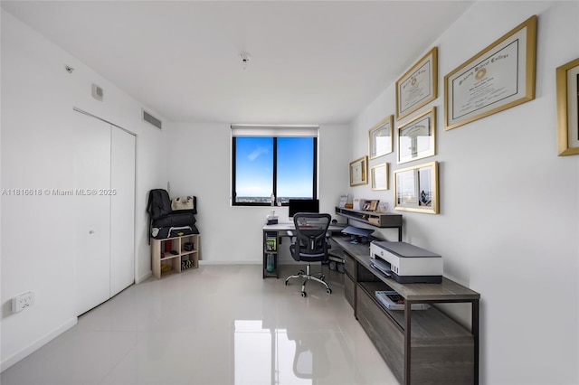 5252 NW 85th Ave Unit 1701, Doral, FL 33166 - home office featuring baseboards