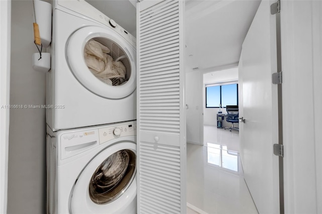 5252 NW 85th Ave Unit 1701, Doral, FL 33166 - laundry area with stacked washer and clothes dryer