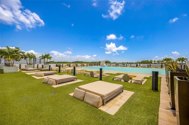 5252 NW 85th Ave Unit 1701, Doral, FL 33166 - view of home's community with a pool and a yard