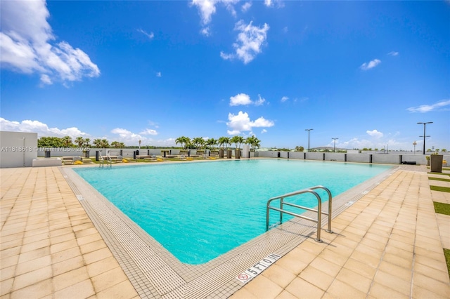 5252 NW 85th Ave Unit 1701, Doral, FL 33166 - community pool with a patio area