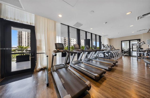5252 NW 85th Ave Unit 1701, Doral, FL 33166 - workout area featuring wood finished floors and recessed lighting