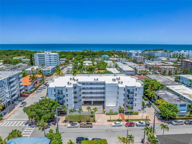 7921 Byron Ave Unit 407, Miami Beach, FL 33141 - drone / aerial view of apartment complex / building and a nearby body of water