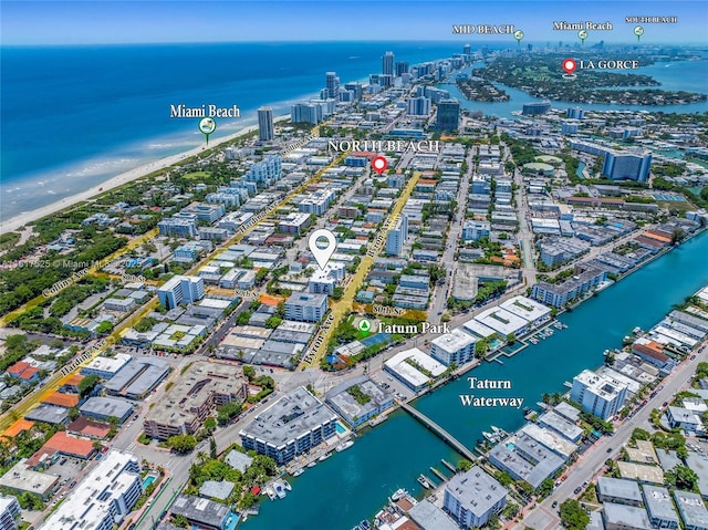 7921 Byron Ave Unit 407, Miami Beach, FL 33141 - aerial view of property and surrounding area featuring a large body of water and nearby urban area