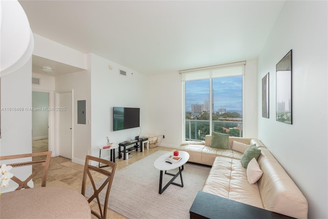 2525 SW 3rd Ave Unit 711, Miami, FL 33129 - living room featuring electric panel and a wall of windows