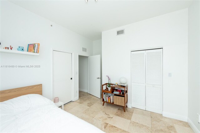2525 SW 3rd Ave Unit 711, Miami, FL 33129 - bedroom with a closet and baseboards