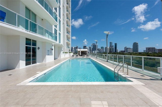2525 SW 3rd Ave Unit 711, Miami, FL 33129 - community pool featuring a skyline view and a patio