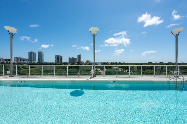 2525 SW 3rd Ave Unit 711, Miami, FL 33129 - community pool featuring a skyline view