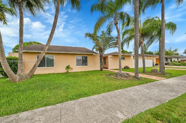 30930 SW 190th Ave, Homestead, FL 33030 - single story home with stucco siding and a front yard