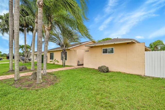 30930 SW 190th Ave, Homestead, FL 33030 - rear view of house featuring stucco siding