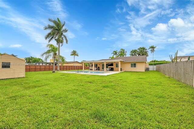 30930 SW 190th Ave, Homestead, FL 33030 - view of yard with a patio area and central air condition unit