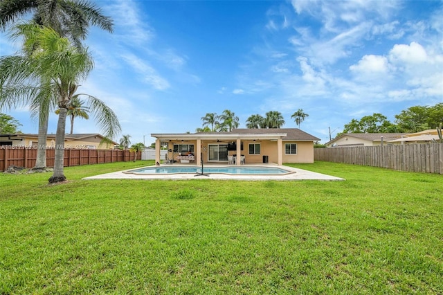 30930 SW 190th Ave, Homestead, FL 33030 - back of property with ceiling fan and a patio area