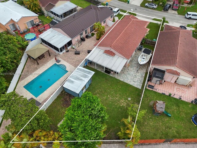 14358 SW 175th Ter, Miami, FL 33177 - aerial perspective of suburban area with a pool and property parcel outlined