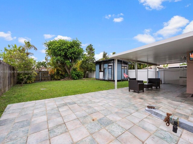 14358 SW 175th Ter, Miami, FL 33177 - view of patio / terrace with an outdoor structure