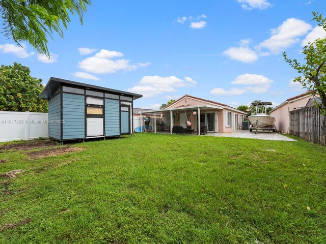 14358 SW 175th Ter, Miami, FL 33177 - view of yard with a patio area
