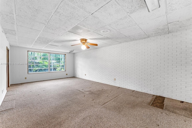 9401 SW 78th St, Miami, FL 33173 - spare room with ceiling fan, carpet, and a drop ceiling