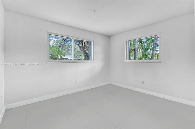 9401 SW 78th St, Miami, FL 33173 - tiled empty room with plenty of natural light