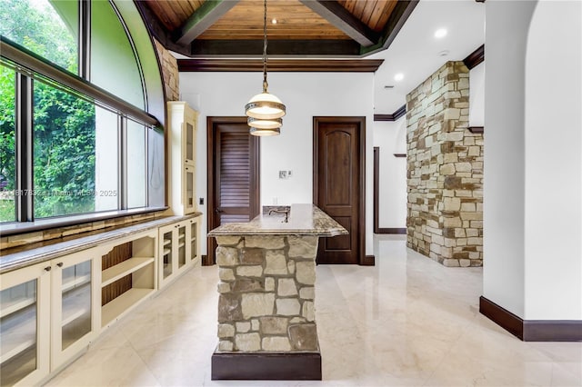9801 SW 60th Ct, Pinecrest, FL 33156 - kitchen with wood ceiling with exposed beams, hanging light fixtures, a center island, stone countertops, and recessed lighting