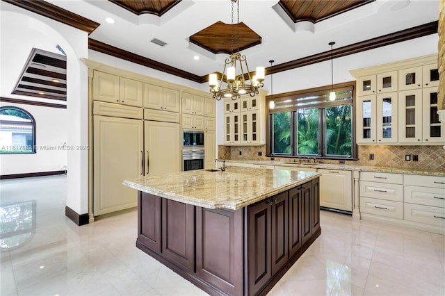 9801 SW 60th Ct, Pinecrest, FL 33156 - kitchen featuring cream cabinetry, built in appliances, light marble finish floors, ornamental molding, and healthy amount of natural light