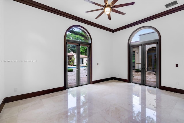9801 SW 60th Ct, Pinecrest, FL 33156 - spare room with french doors, ornamental molding, baseboards, a ceiling fan, and light marble finish flooring