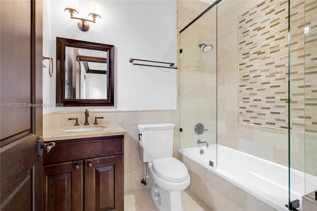 9801 SW 60th Ct, Pinecrest, FL 33156 - bathroom with toilet, vanity, tub / shower combination, and tile walls