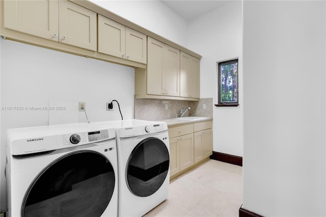 9801 SW 60th Ct, Pinecrest, FL 33156 - washroom with washer and dryer, cabinet space, light marble finish floors, and baseboards