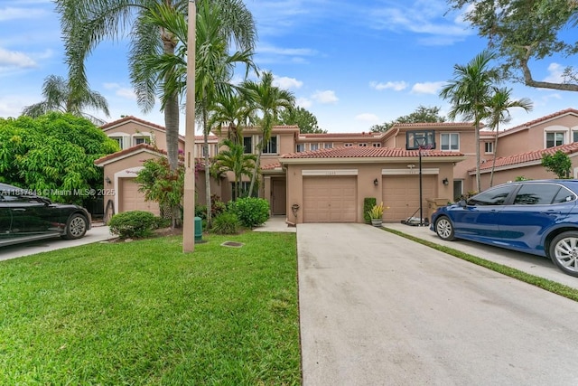 11045 SW 16th Mnr, Davie, FL 33324 - view of front of home featuring driveway, stucco siding, a front yard, and a tiled roof