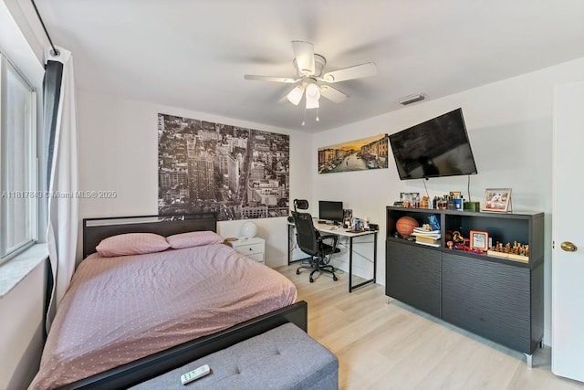 11045 SW 16th Mnr, Davie, FL 33324 - bedroom with wood finished floors, a desk, and ceiling fan