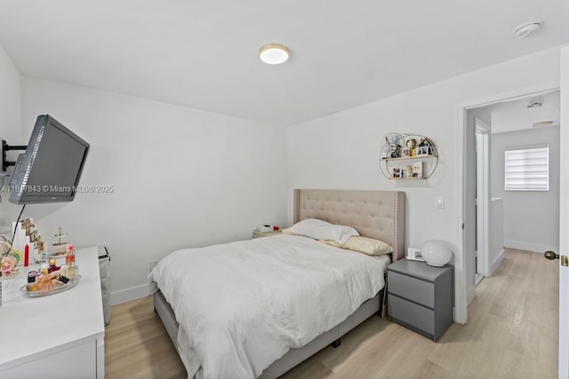 11045 SW 16th Mnr, Davie, FL 33324 - bedroom with light wood finished floors and baseboards