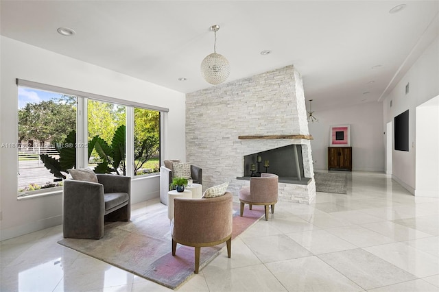 11001 SW 64th Ave, Pinecrest, FL 33156 - living area featuring a fireplace and light tile patterned floors