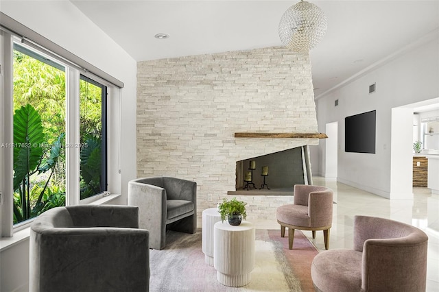 11001 SW 64th Ave, Pinecrest, FL 33156 - tiled living room featuring a fireplace and baseboards